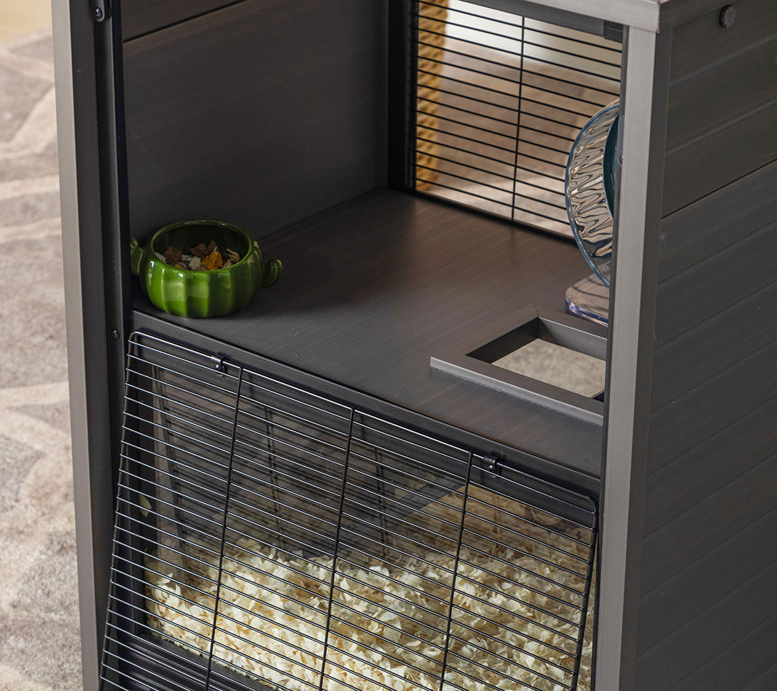 apertura de acceso a la jaula para hamsters